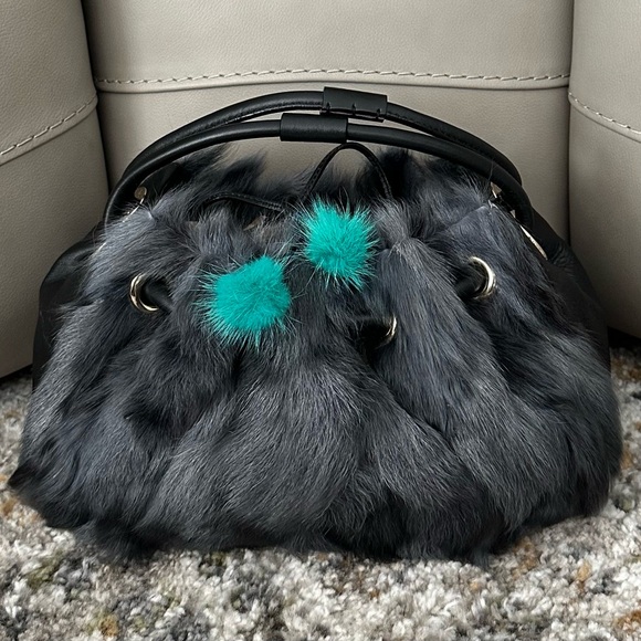 kate spade Handbags - KATE SPADE RARE VINTAGE BLACK LEATHER GREY TONE FAUX FUR DRAWSTRING HANDBAG